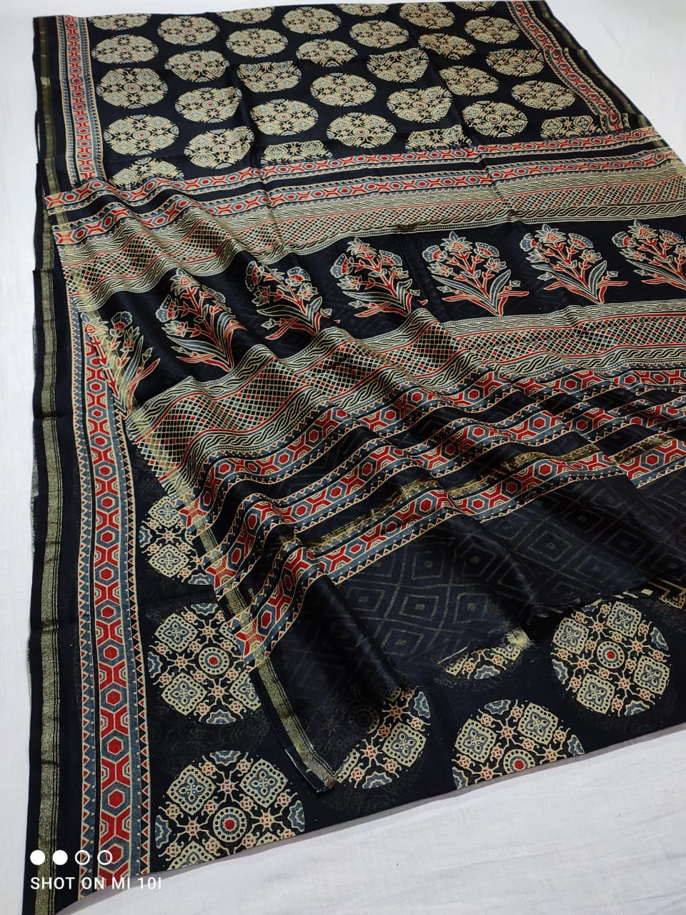 "Multicoloured Ajrakh Magic: Chanderi Silk Cotton Saree with Softness and Elegance"