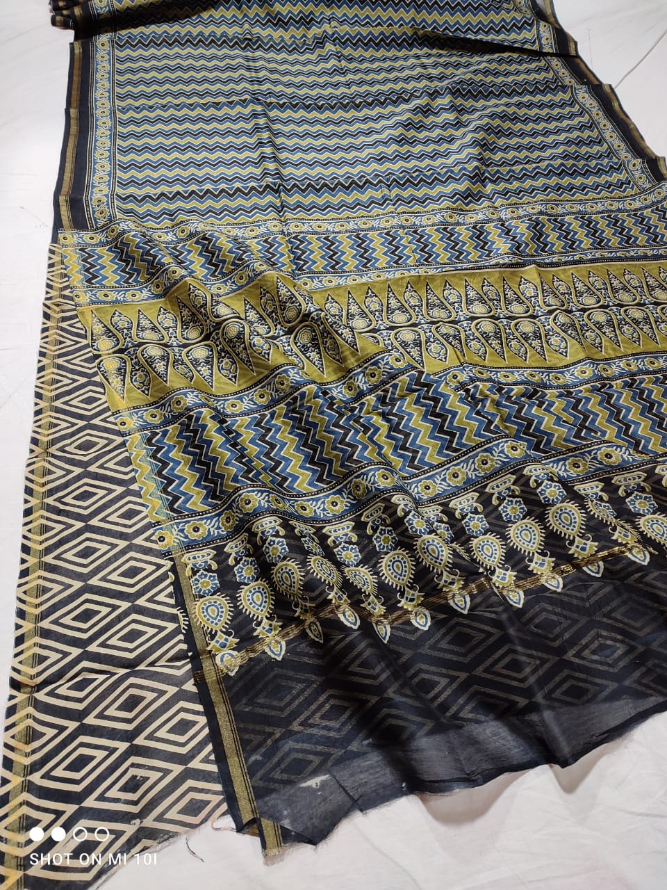 "Multicoloured Ajrakh Magic: Chanderi Silk Cotton Saree with Softness and Elegance"